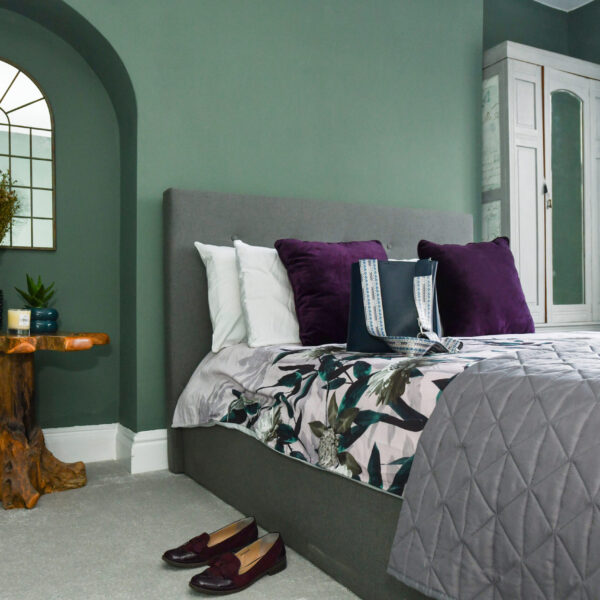 Modern-green-themed-bedroom-with-natural-tones-and-calming-atmosphere-emma-martin-interiors-nottingham